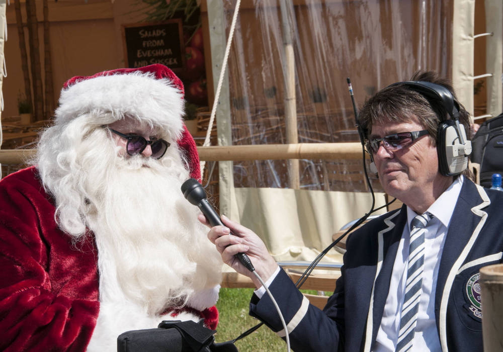 Santa being interviewed by Mike Reid